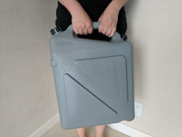 How easy is it to carry an emergency water container