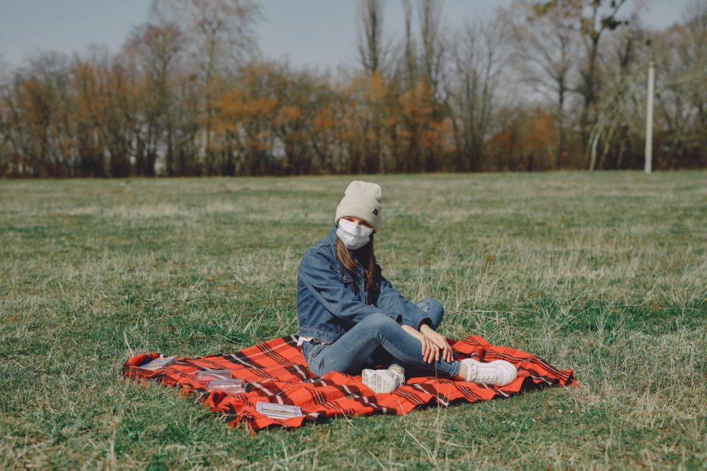 person-on-picnic-in-face-mask-hero-CC